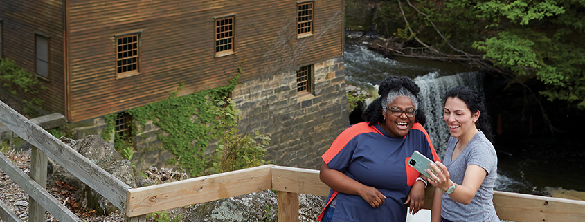 Two women visiting Lantermans Mill in Mill Creek Park in Youngstown, Ohio.